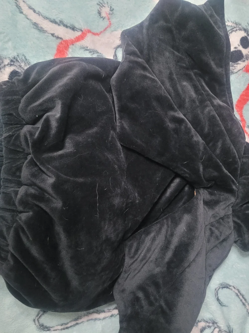 Source Unknown plush black